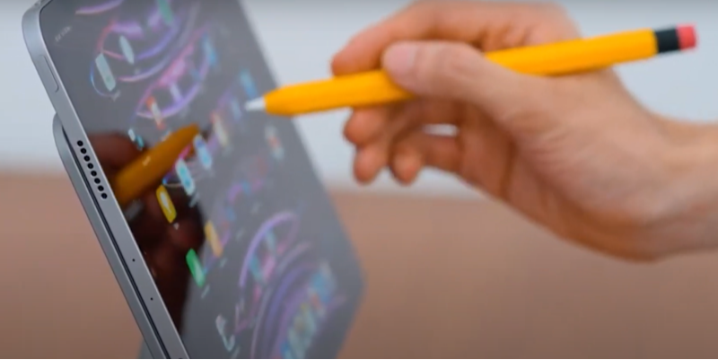 a hand using ipad